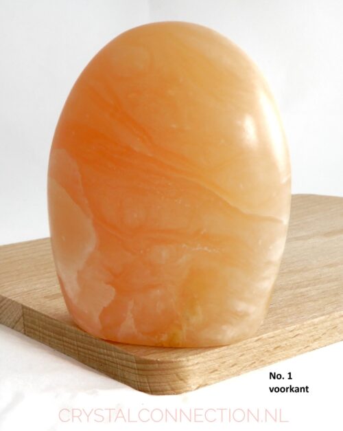 Calciet oranje-perzik vrije vorm