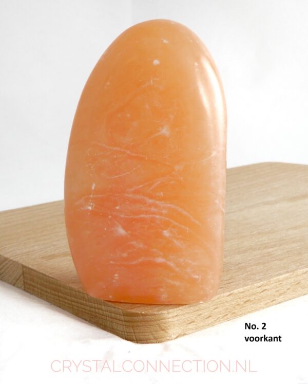 Calciet oranje-perzik vrije vorm