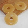 calsiet-oranje-donut-4cm-scaled Amethist donut