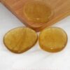 fluoriet-geel-schijfsteen Fluoriet trommelsteen