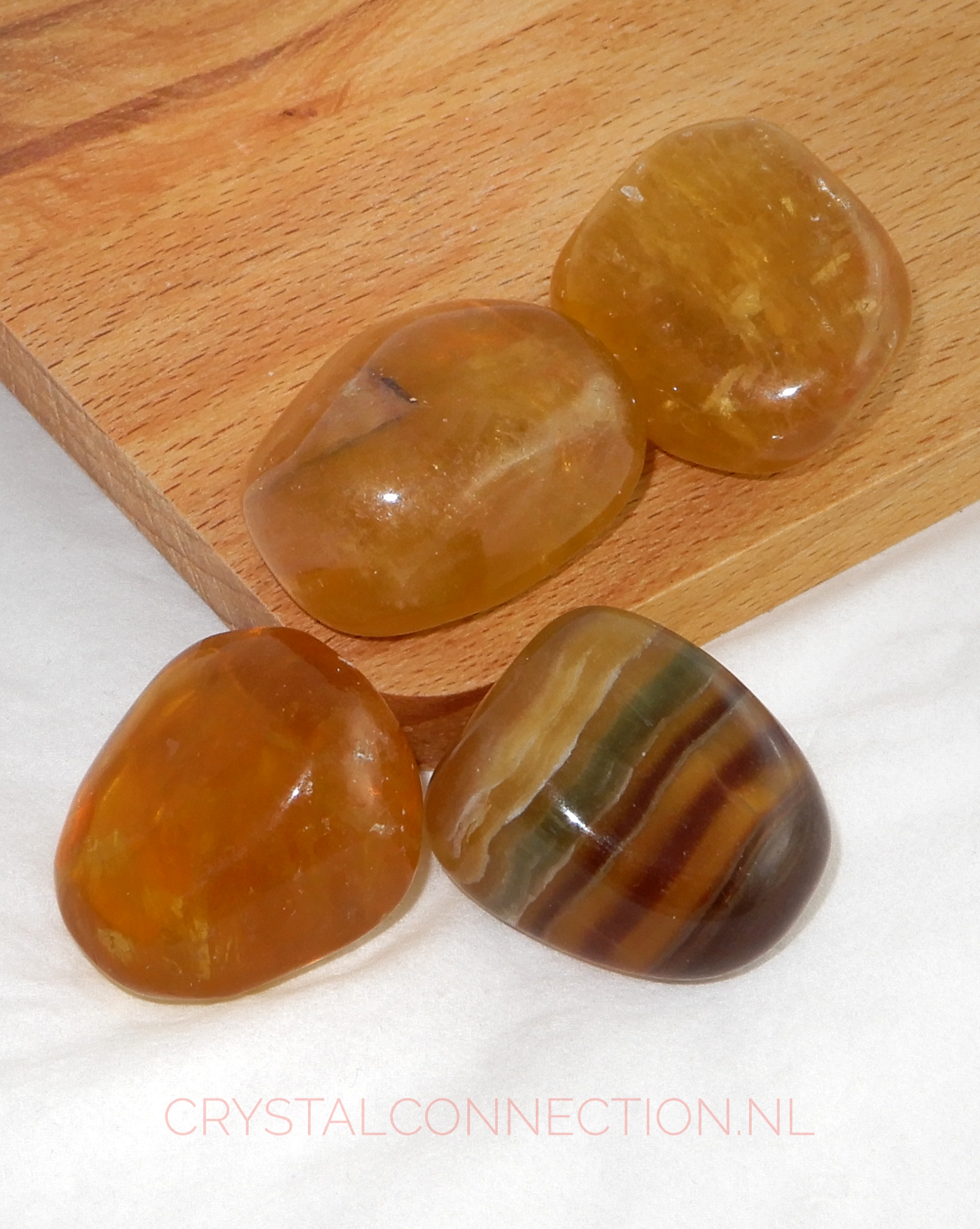 Fluoriet geel trommelsteen