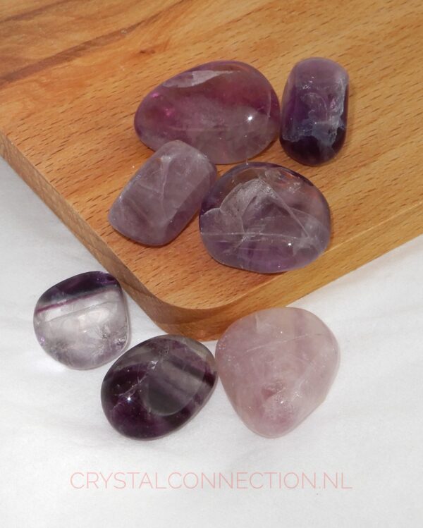 fluoriet-trommelsteen-roze-paars Fluoriet trommelsteen